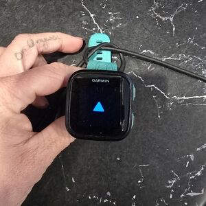 Garmin Teal and Black Fitness Watch